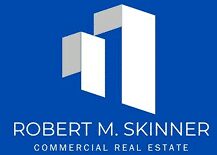Logo of Robert M. Skinn Commercial Real Estate with stylized buildings.