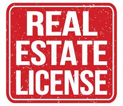A red sign with white text saying Real Estate License.