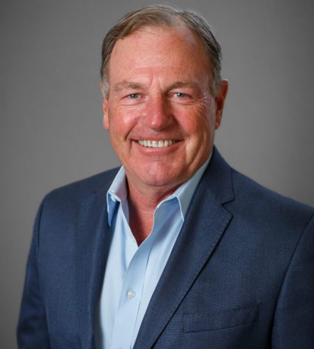 Smiling man in blue suit jacket